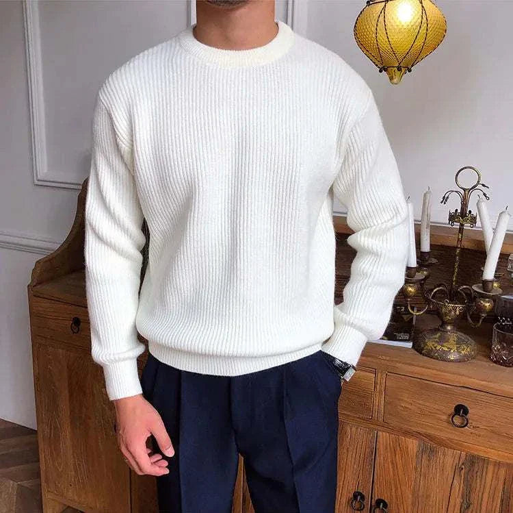 Antonios solid round neck knit sweater in white, made from high-quality standard wool.