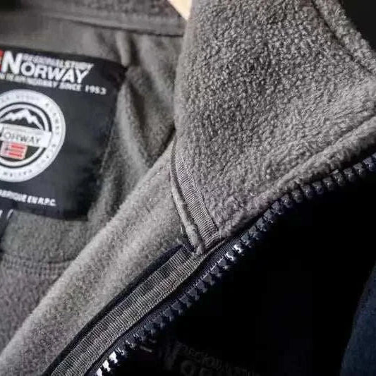 Norway puffer jacket label and interior fabric close-up.