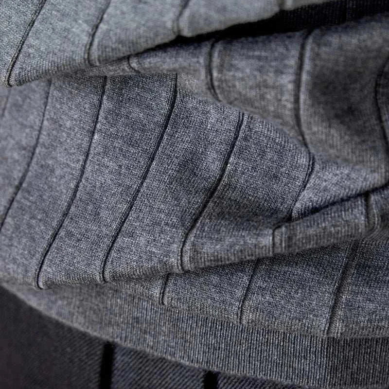Gray ribbed fabric of the Autumn turtleneck premium sweater.