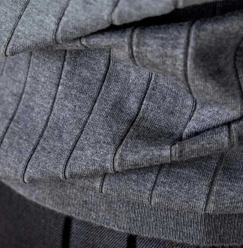 Gray ribbed fabric of the Autumn turtleneck premium sweater.