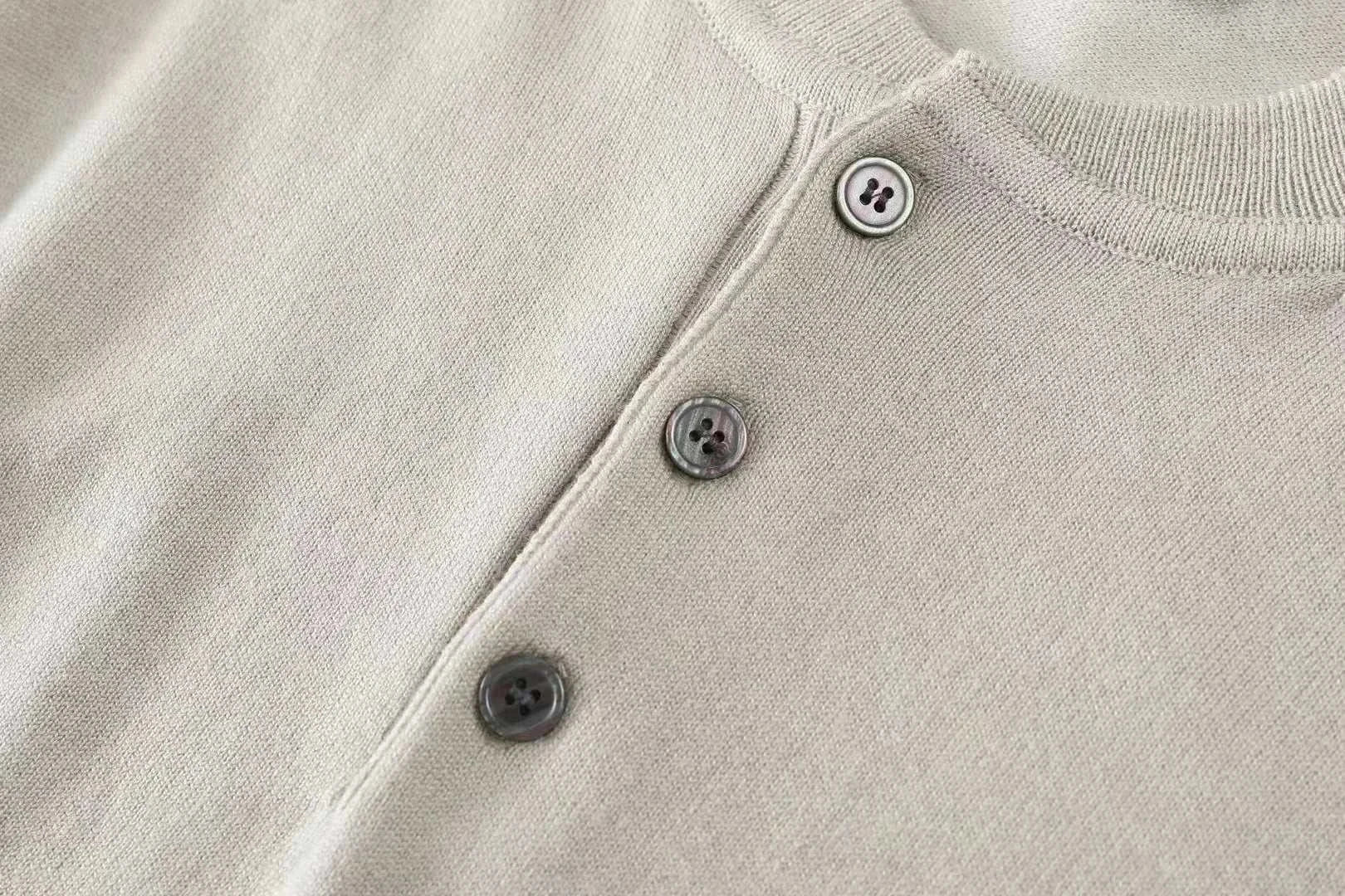 Autumn Korean premium sweater with buttons detail showing premium wool fabric.