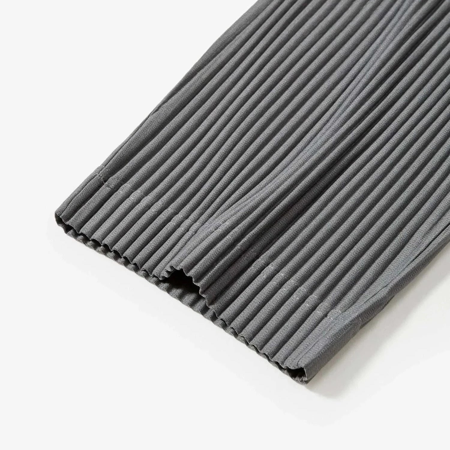 Baggy relaxed fit casual trousers with ribbed texture in solid grey design.