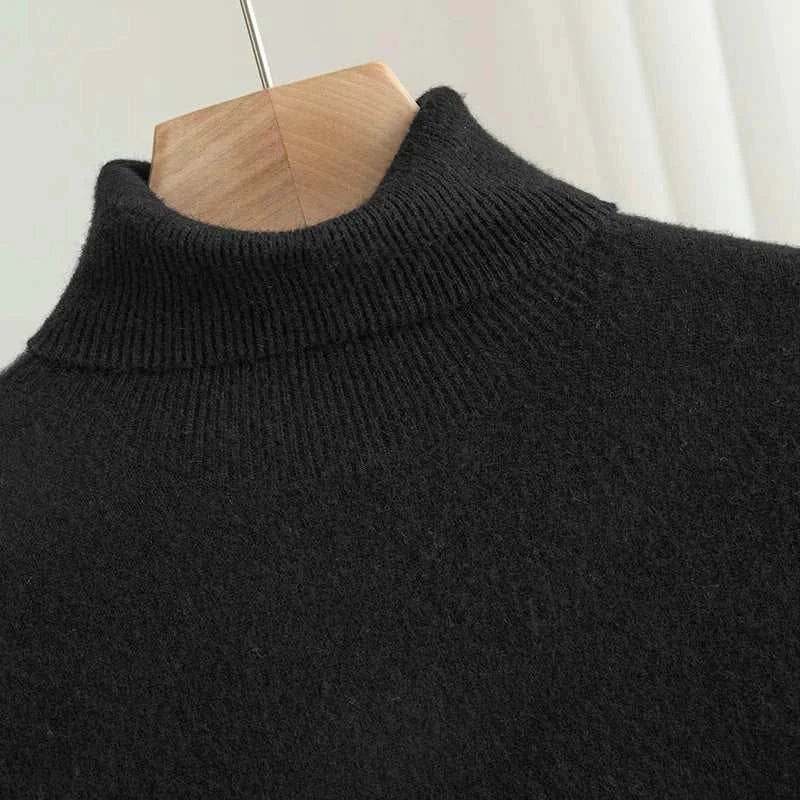 Business wool turtleneck sweater for men, black color, close-up view.