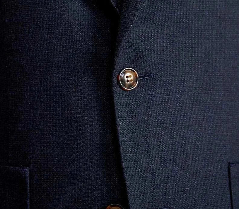 Slim fit cotton-linen blend jacket with buttons detail.