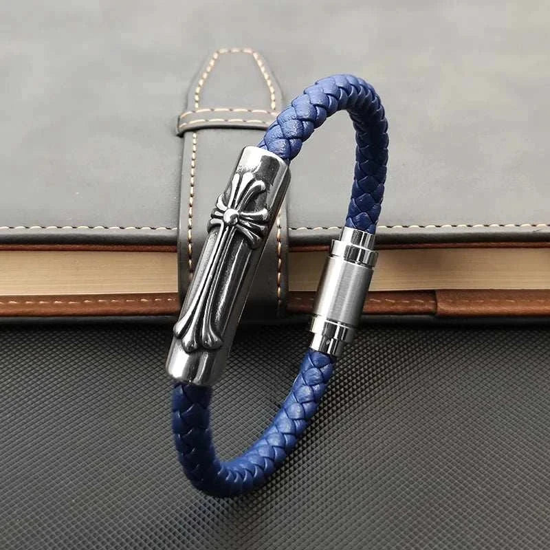 Leather bracelet with stainless steel cross on braided PU band.