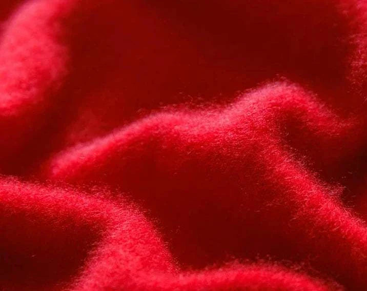 Luxurious pure wool sweater fabric in vivid red, ideal for keeping warm in cold seasons.