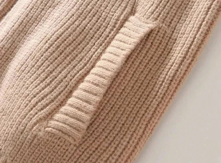Warm beige knit pocket detail on autumn stand collar zipper jacket.