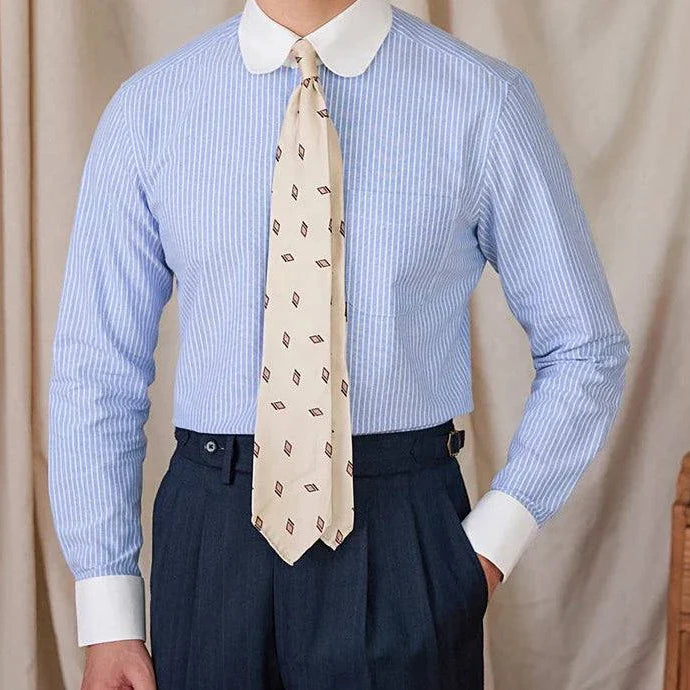 Antonios striped cotton business shirt displayed on a mannequin, featuring a classic collar and buttoned cuffs.