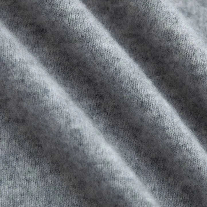 Luxurious wool fabric texture of business turtleneck sweater.