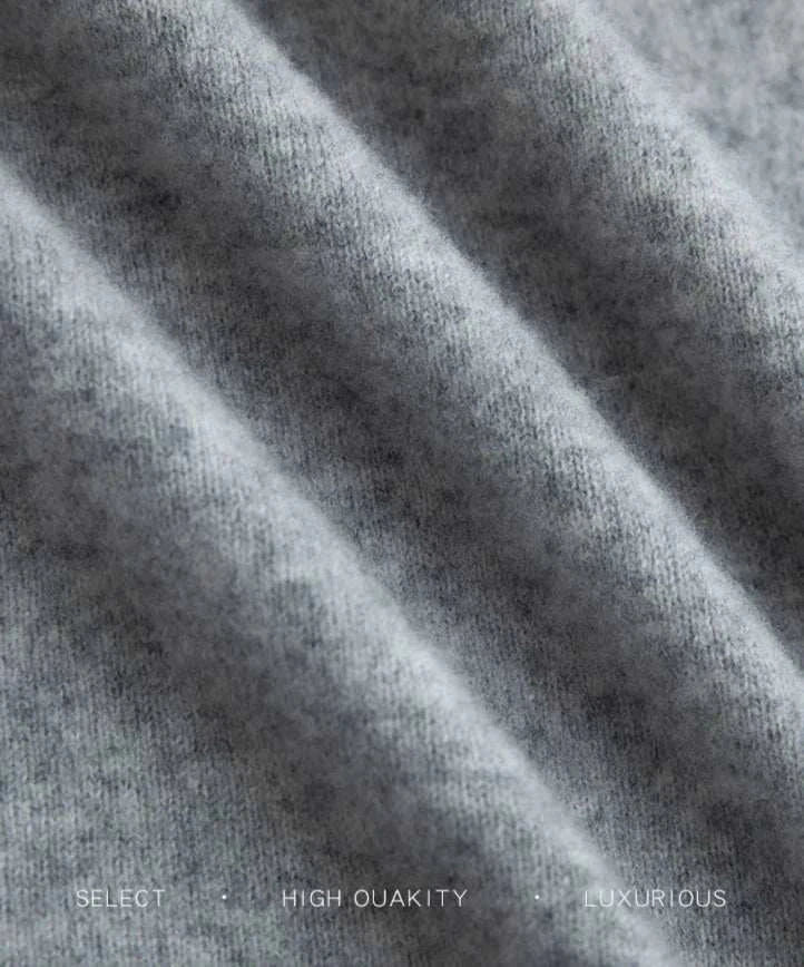 Luxurious wool fabric texture of business turtleneck sweater.