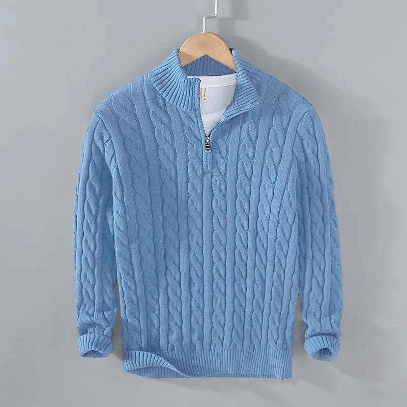 Blue braided cotton sweater with half zipper, ideal for autumn warmth and style.