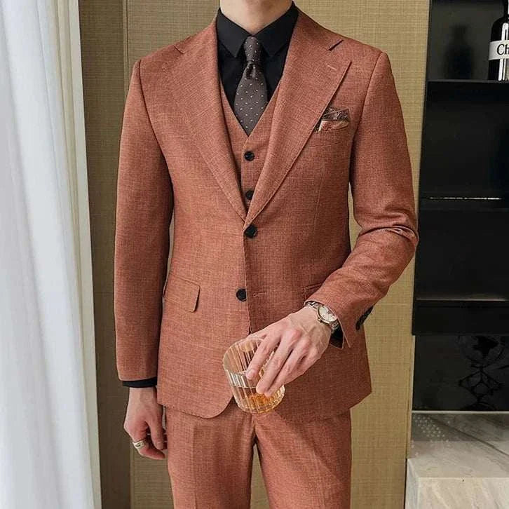 Elegant brown groom wedding 3 piece suit with tie, showcasing style and sophistication.