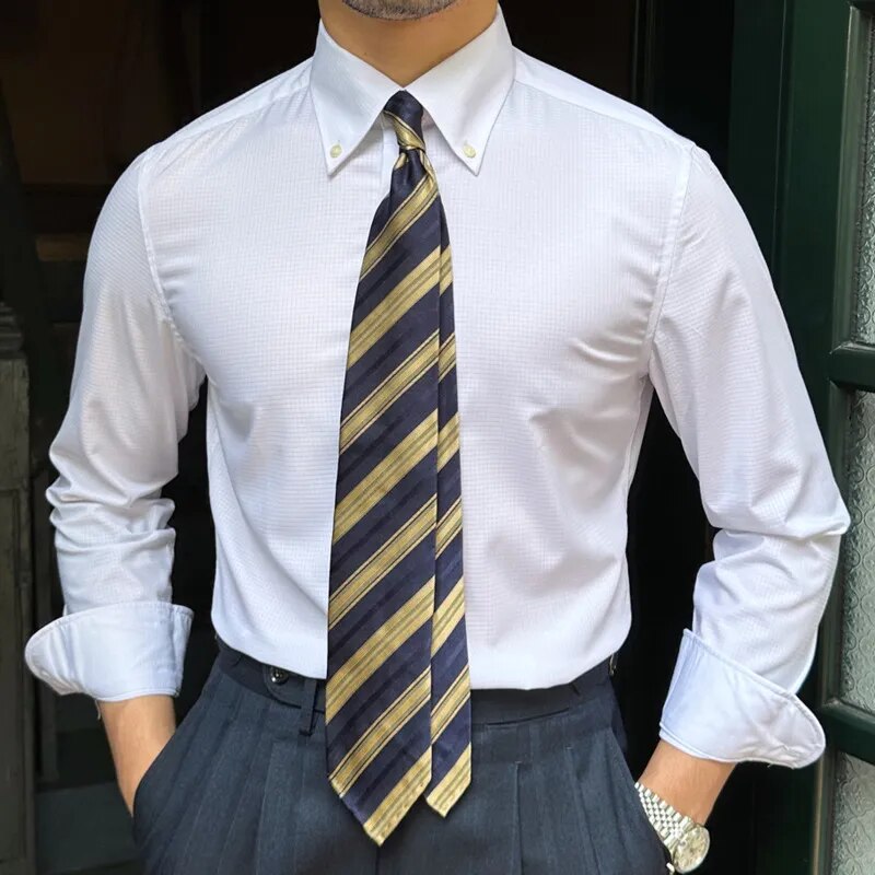 Antonios Oxford Shirt in white, long sleeve smart casual style, solid pattern, worn with a striped tie.