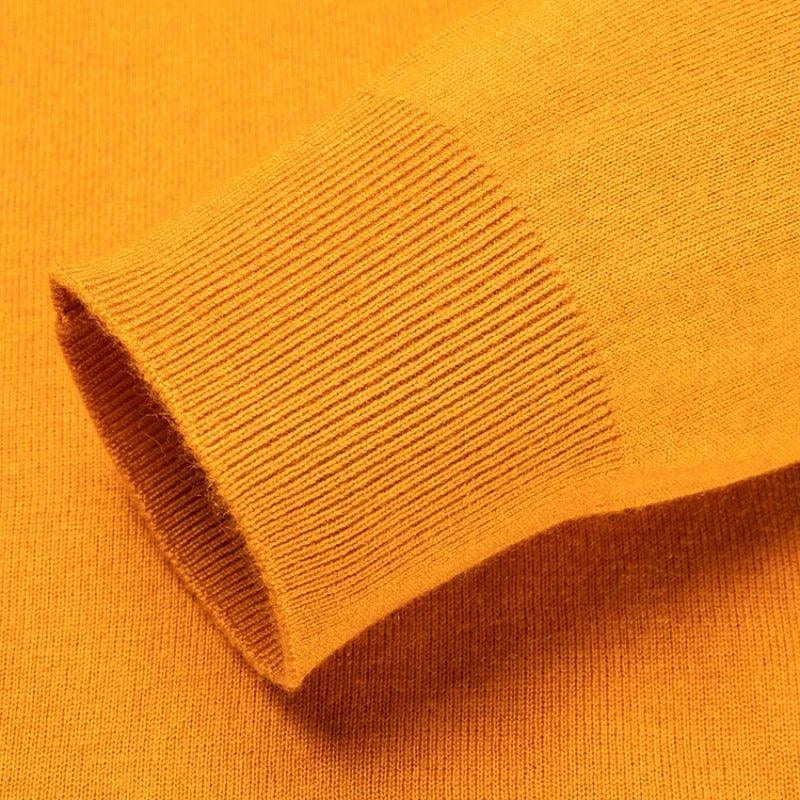 Close-up of the Antonios Business Polo Premium Sweater highlighting the ribbed cuff detail in a soft wool-viscose blend.