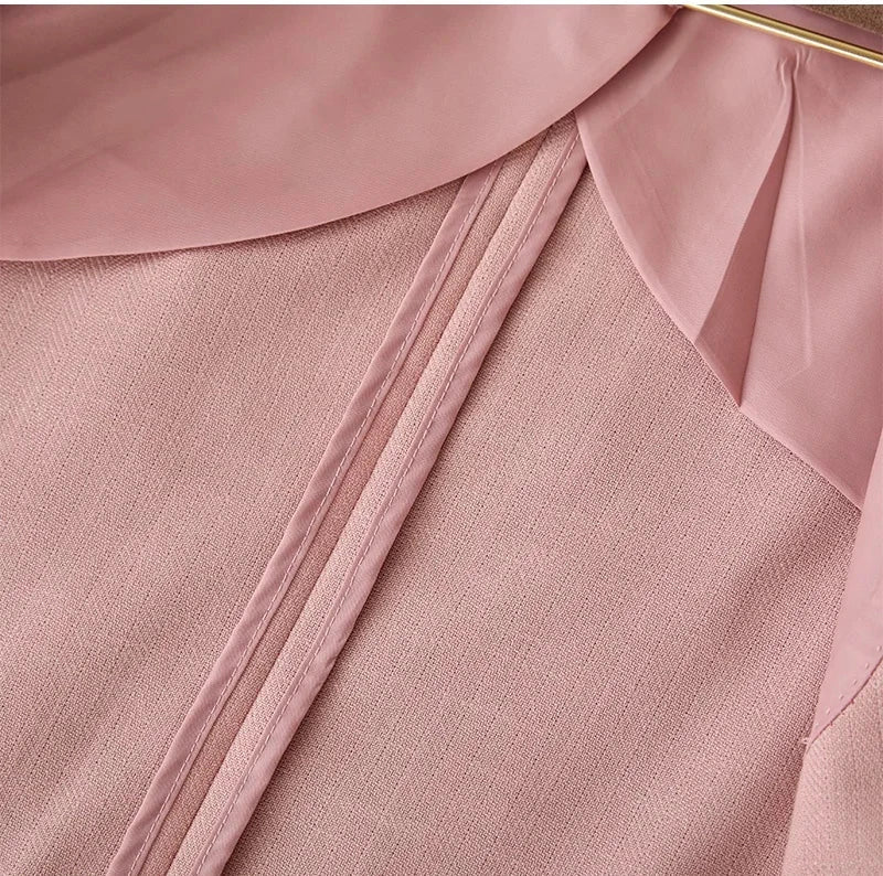 Close-up of Business linen relaxation jacket in pink polyester fabric.