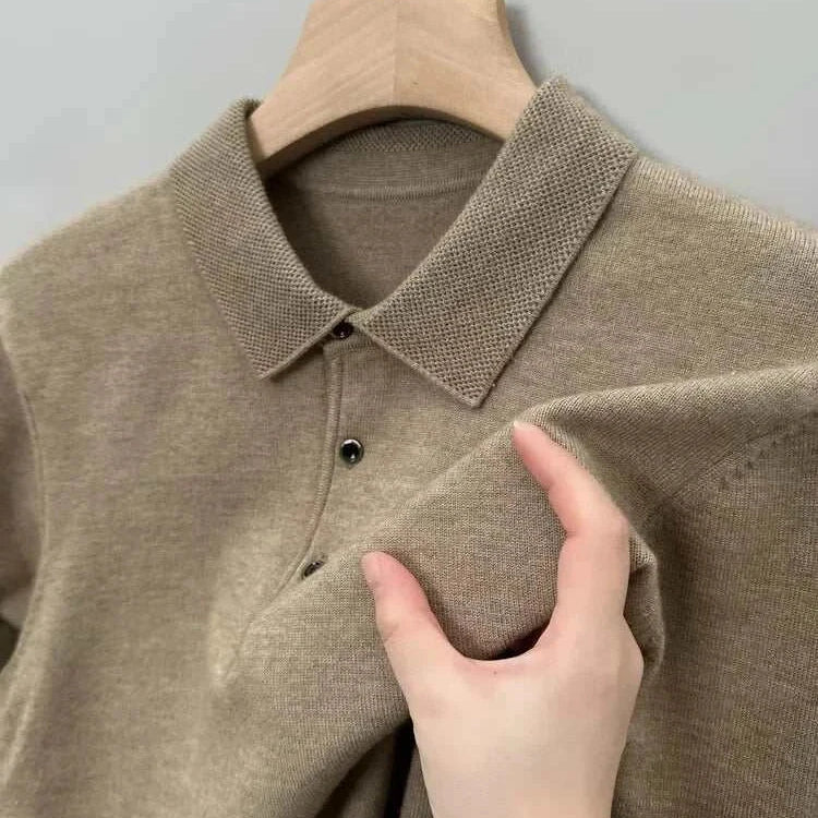 Beige Antonios polo sweater with buttons on hanger.