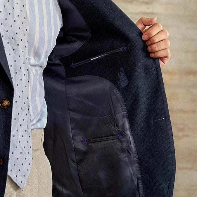 Slim fit cotton-linen blend jacket interior detailing.