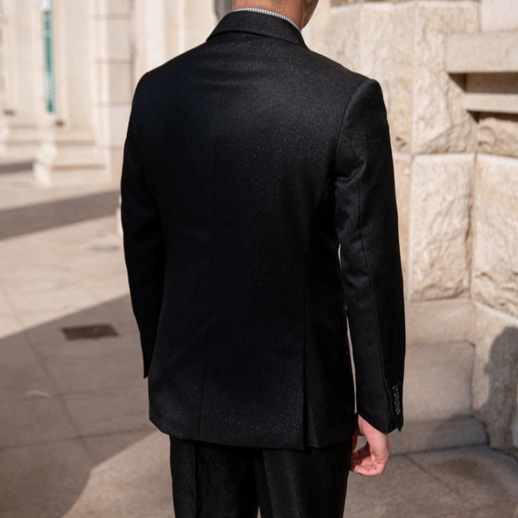 Antonios Double Breast Suit in black viewed from the back, showcasing sophisticated design and premium fabric.