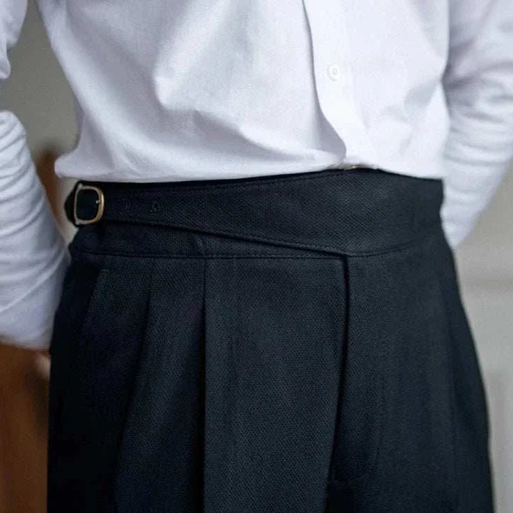 Cold season straight trousers for men in solid black, polyester material.