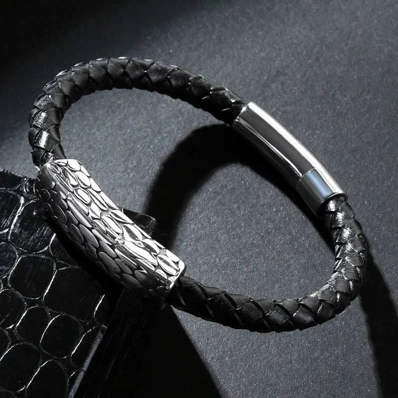 Genuine leather braided bracelet with stainless steel clasp on display.
