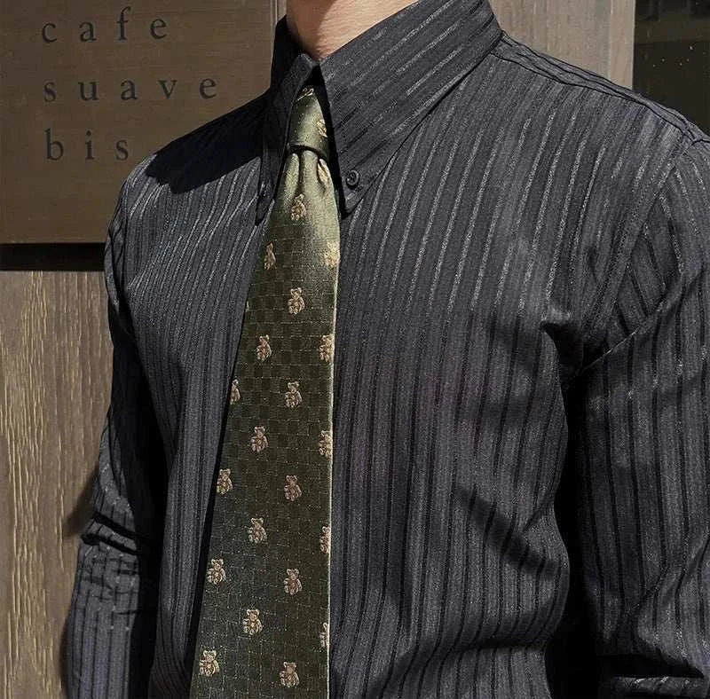 Slim-fit striped shirt with pointed collar, elegant men's fashion.