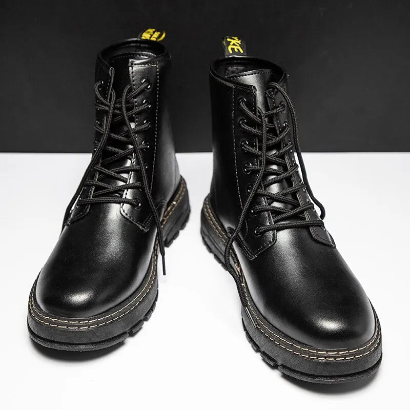 Black leather boots with sleek design, featuring durable stitching and lace-up closure, perfect for men in colder seasons.