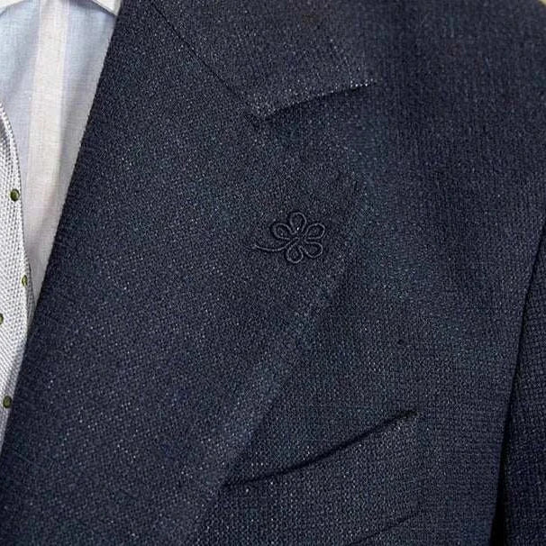 Slim fit cotton-linen blend jacket with elegant design and high-quality material.