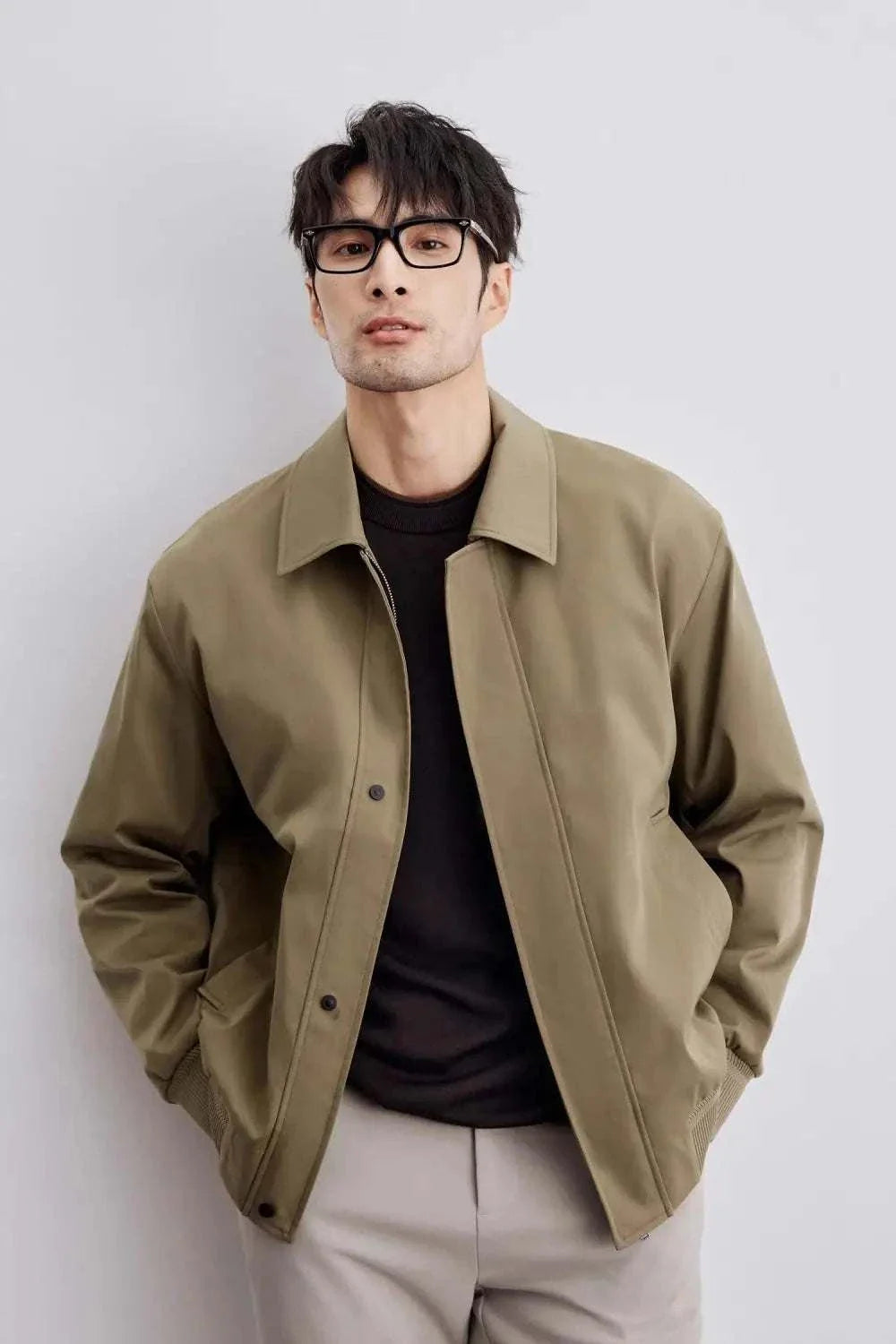 Korean bomber winter jacket in olive green, stylish and cozy for men's winter fashion.