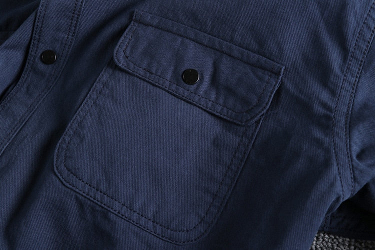 Close-up of navy Vintage-Retro Cotton Shirt with pocket detail.