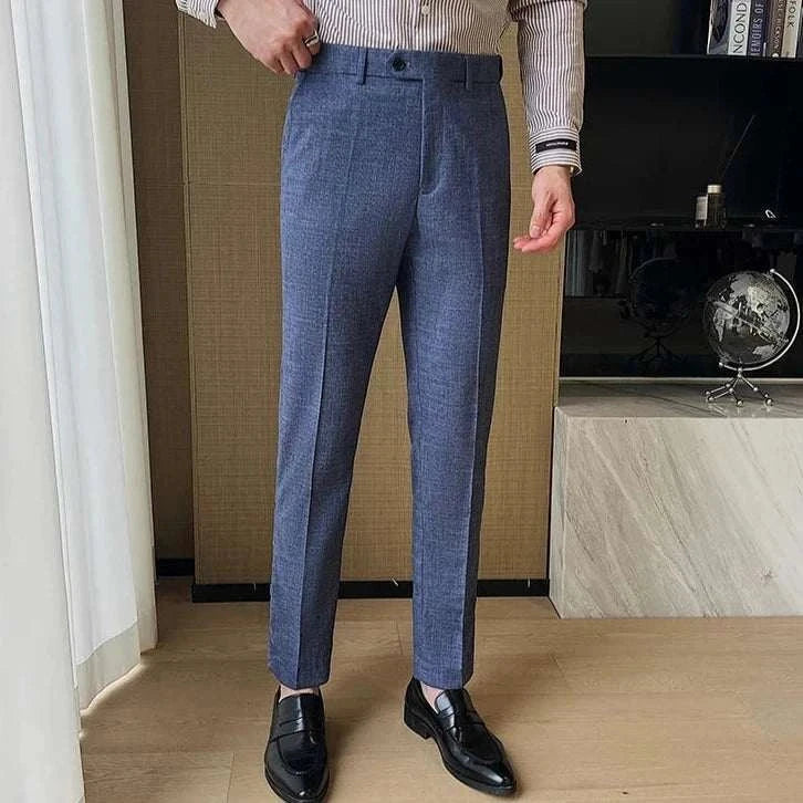 Groom wedding 3 piece suit trousers in elegant blue fabric.