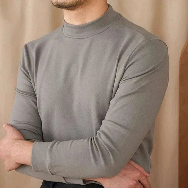 Soft half turtleneck sweater for men in gray, showcasing comfort and perfect fitting.
