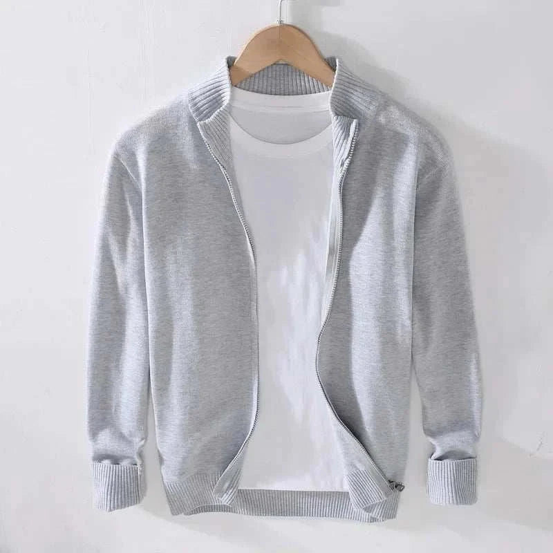 Smart casual cardigan made of 100% cotton on a hanger.