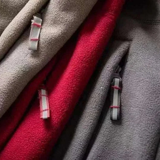 Norway puffer jackets in khaki, red, and gray colors with zipper details.