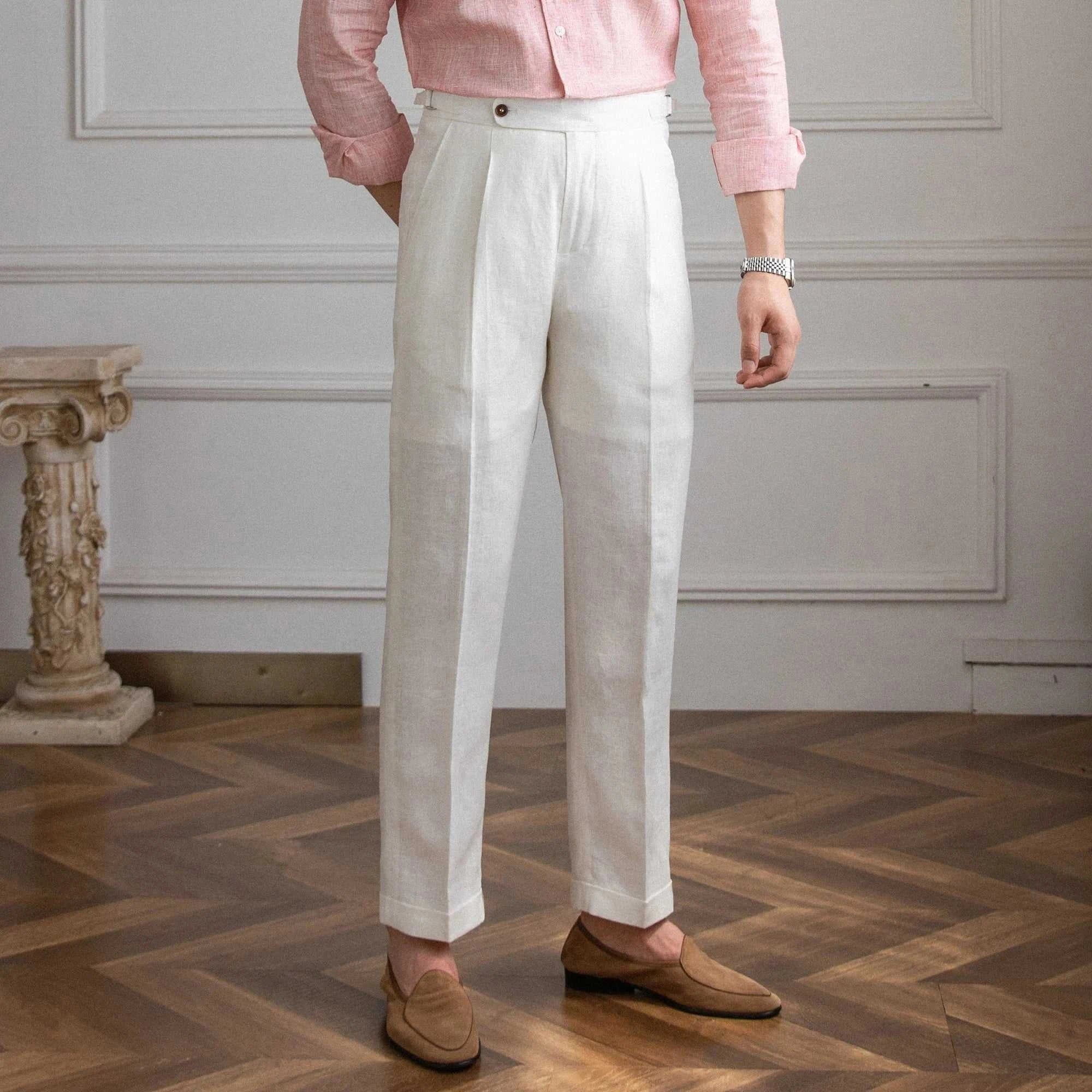 Lightweight Italian high-waist trousers made of 100% linen for men, styled elegantly for summer comfort.