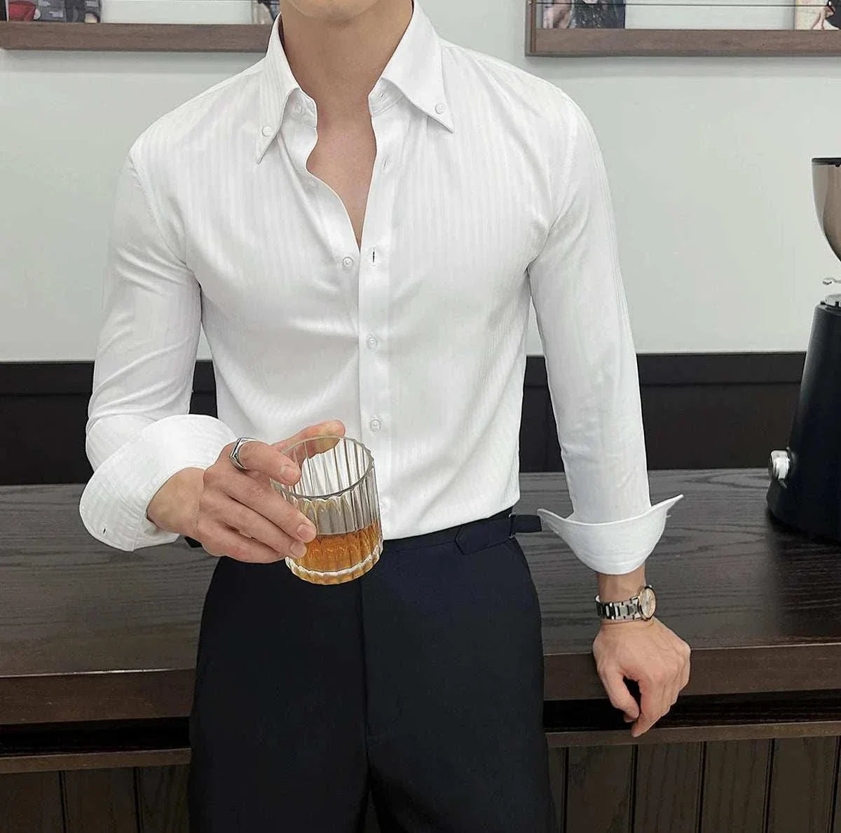 Business casual slim fit shirt in white, ideal for office and elegant occasions, worn by a man holding a drink.