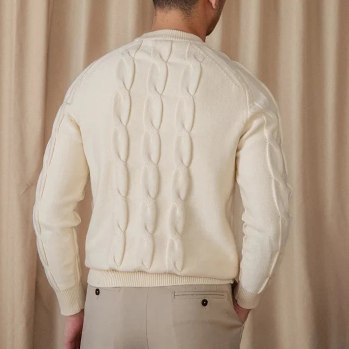 Round neck vintage sweater in cream color on a man with a knitted pattern.