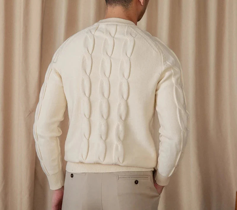 Round neck vintage sweater in cream color on a man with a knitted pattern.