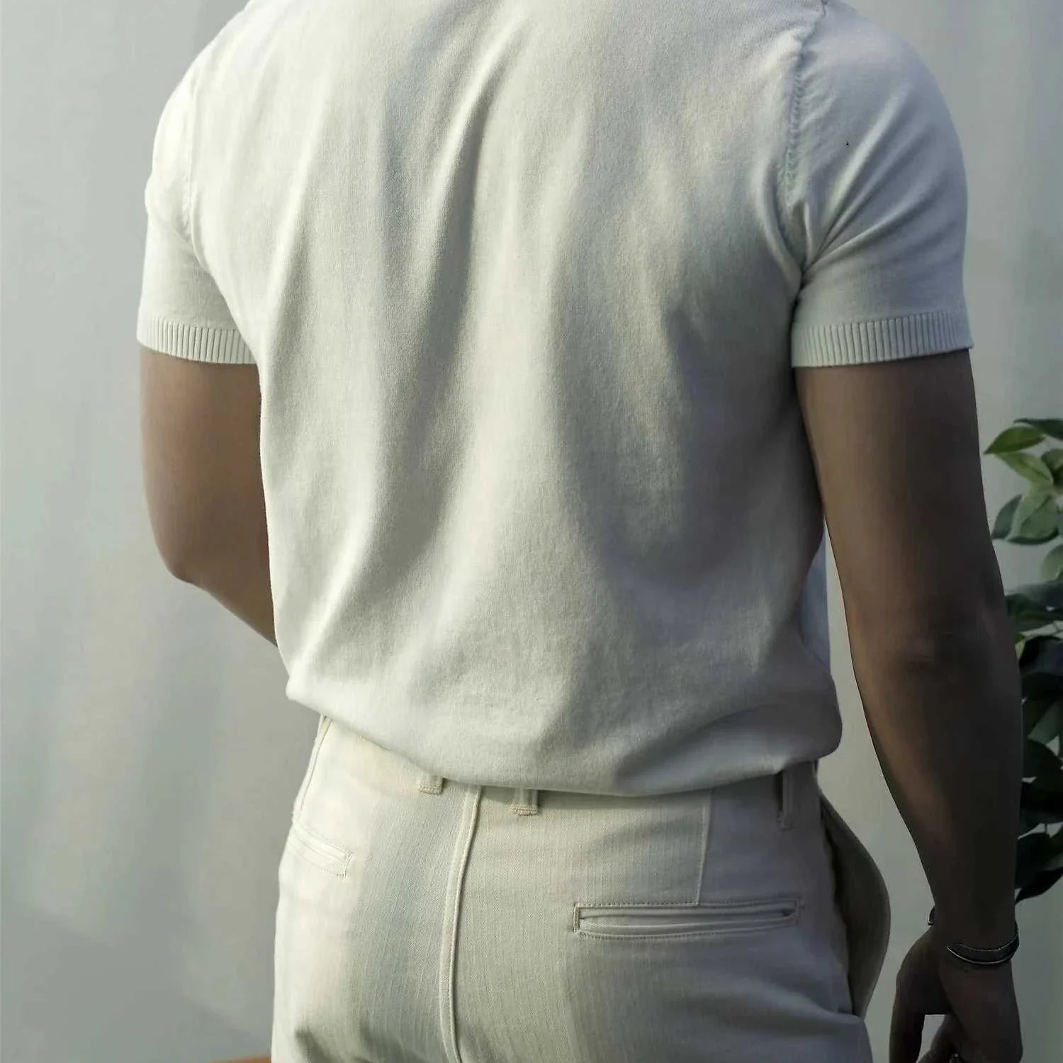 Old money American polo t-shirt for men in white, cotton, back view.