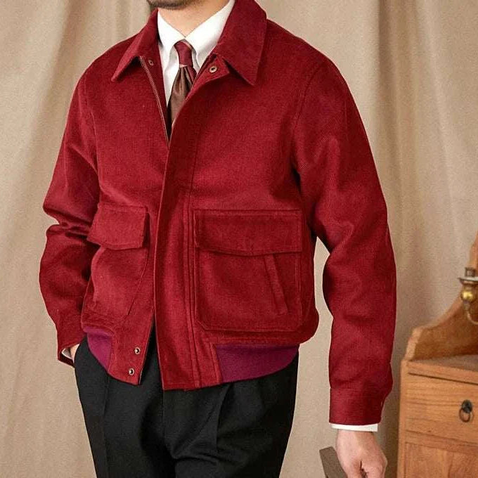 Man wearing a red pure cotton bomber jacket with two front pockets.