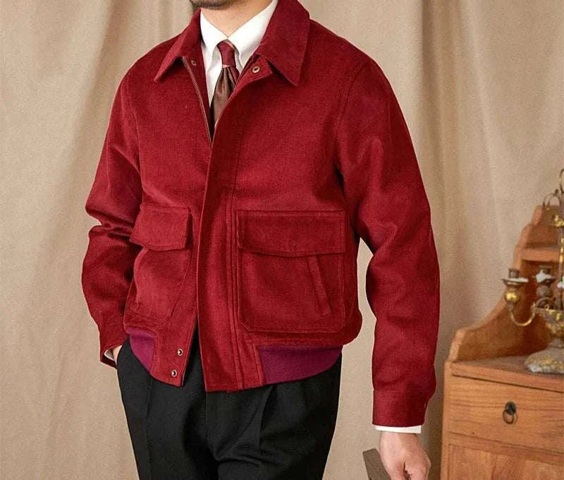 Man wearing a red pure cotton bomber jacket with two front pockets.