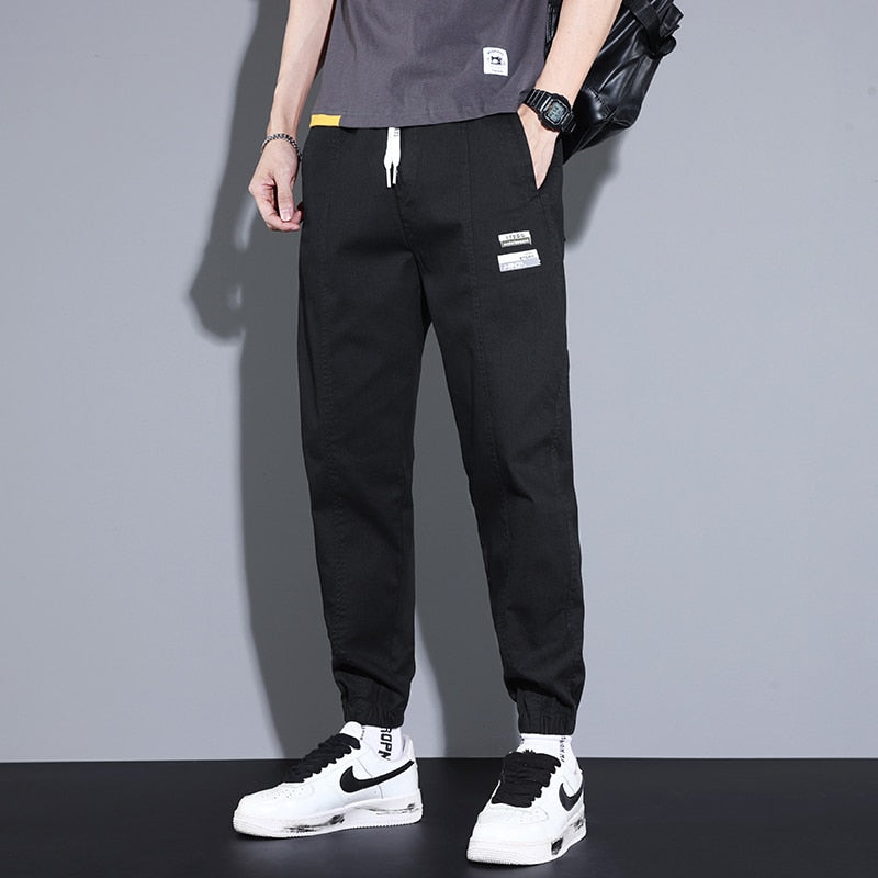 Men's Vinny Loose Pants in black, relaxed fit, cotton and polyester, streetwear casual style.