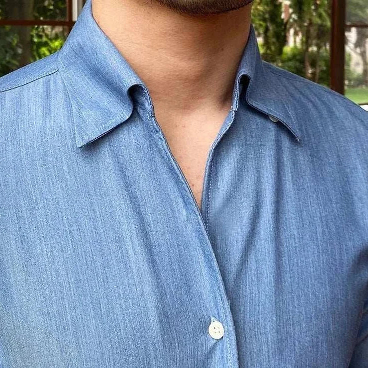 Antonios British casual shirt with classic collar in solid blue polyester fabric.