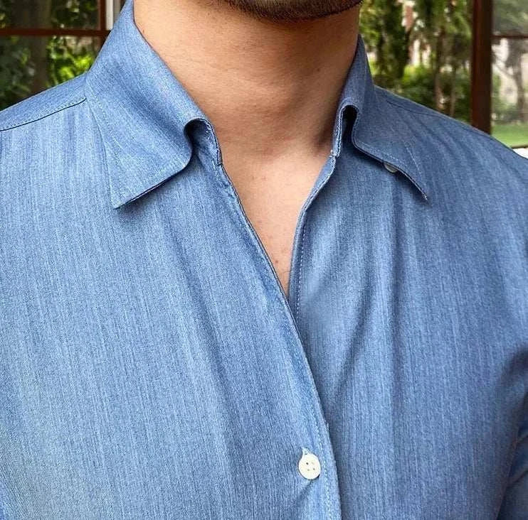 Antonios British casual shirt with classic collar in solid blue polyester fabric.