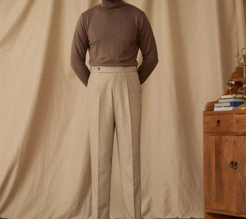 Wool winter Italian trousers on mannequin against beige background.