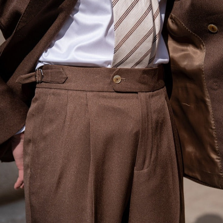 Brown Antonios Double Breast Suit with subtle solid pattern design, ideal for business meetings.