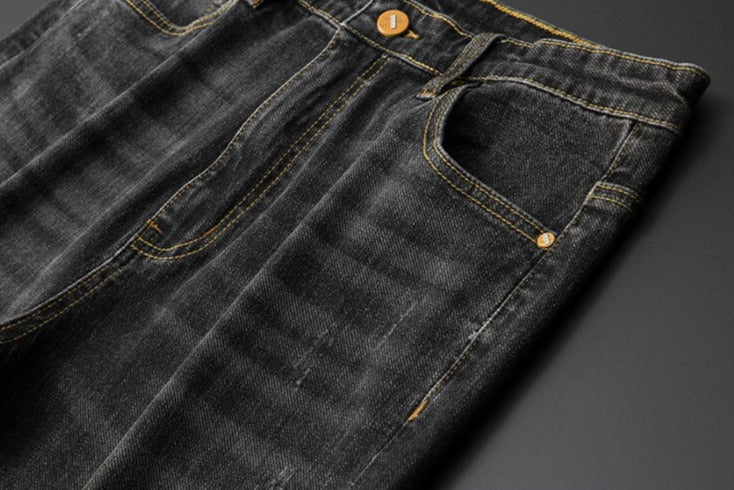 Vinny Simple Jeans in denim with classic stitching and button detail, suitable for casual or semi-formal wear.