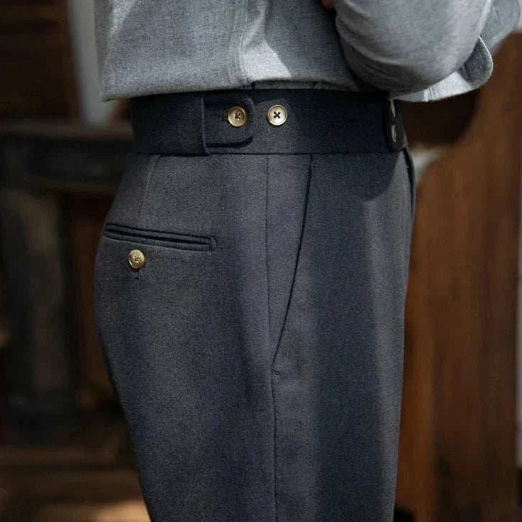 Autumn/Winter retro Italian trousers in solid color with button details.