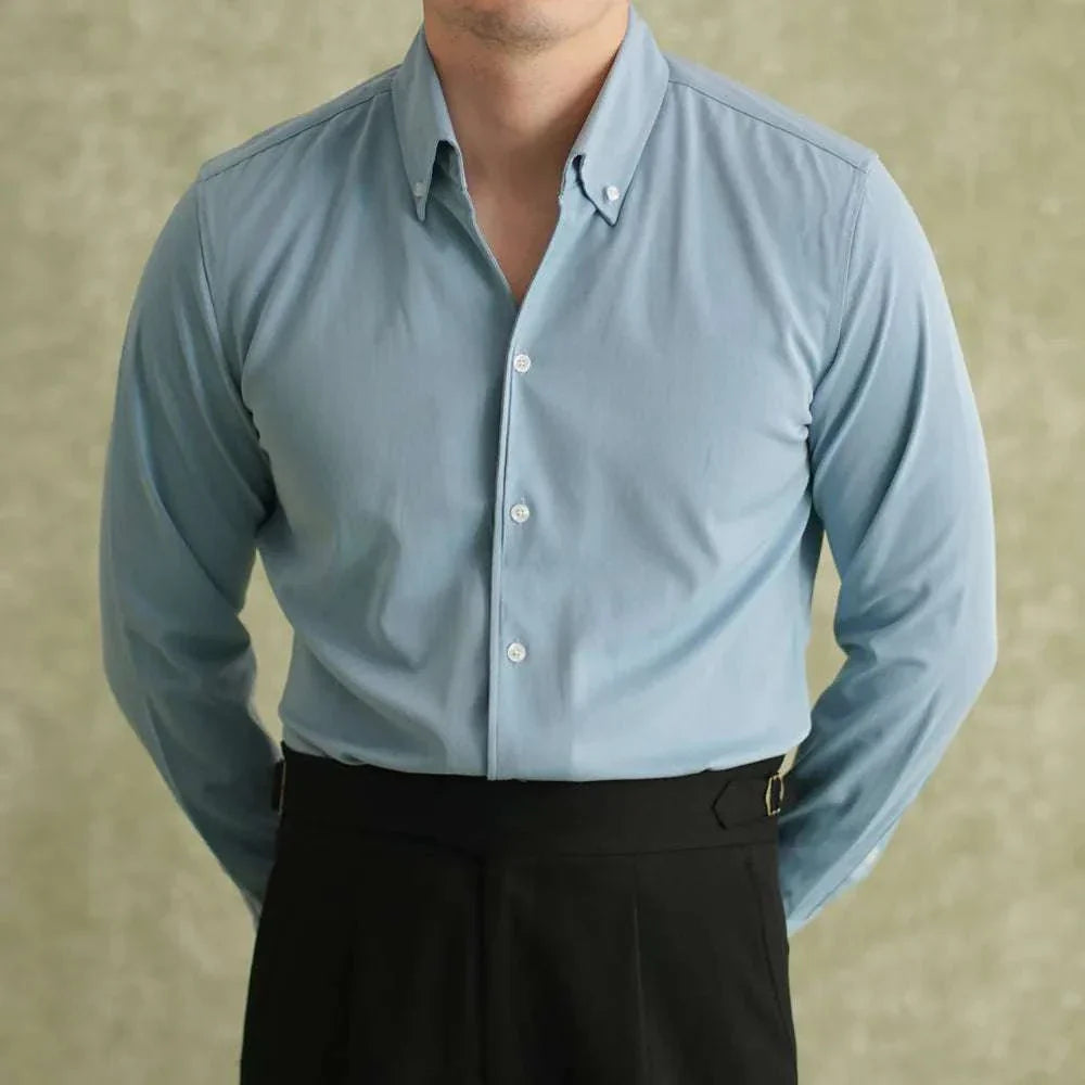 Men's spring pointer collar long sleeve shirt in solid color.