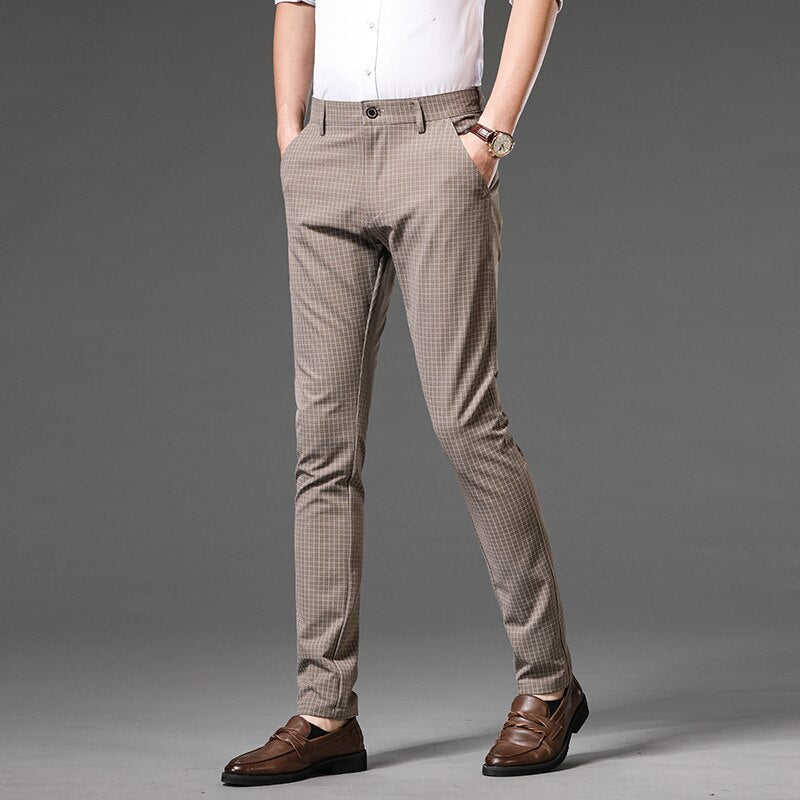 Vinny Plaid Trousers in khaki, full-length casual style, worn by a person with brown shoes.