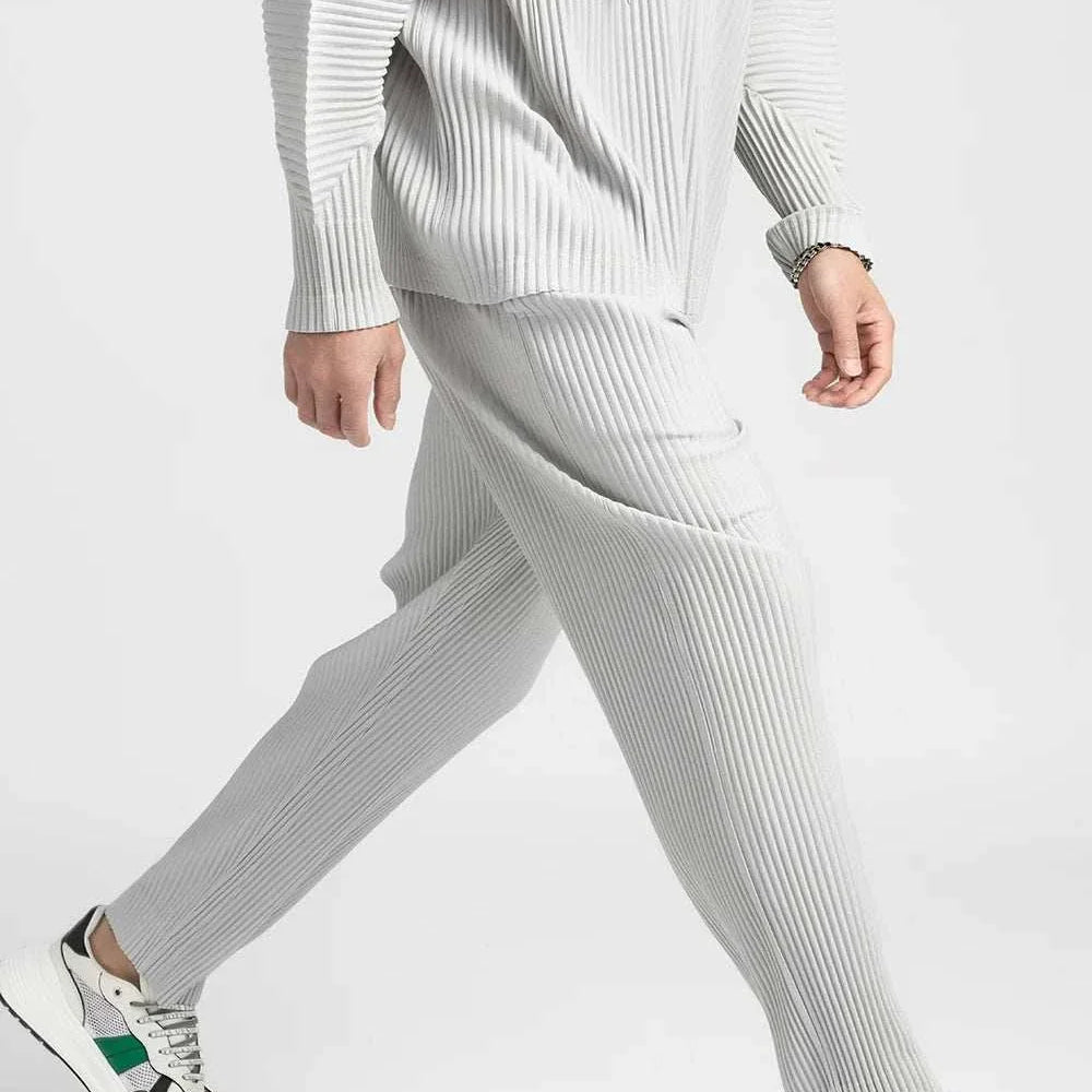 Baggy relaxed fit casual trousers for men in light grey, featuring a loose and comfortable style for casual wear.